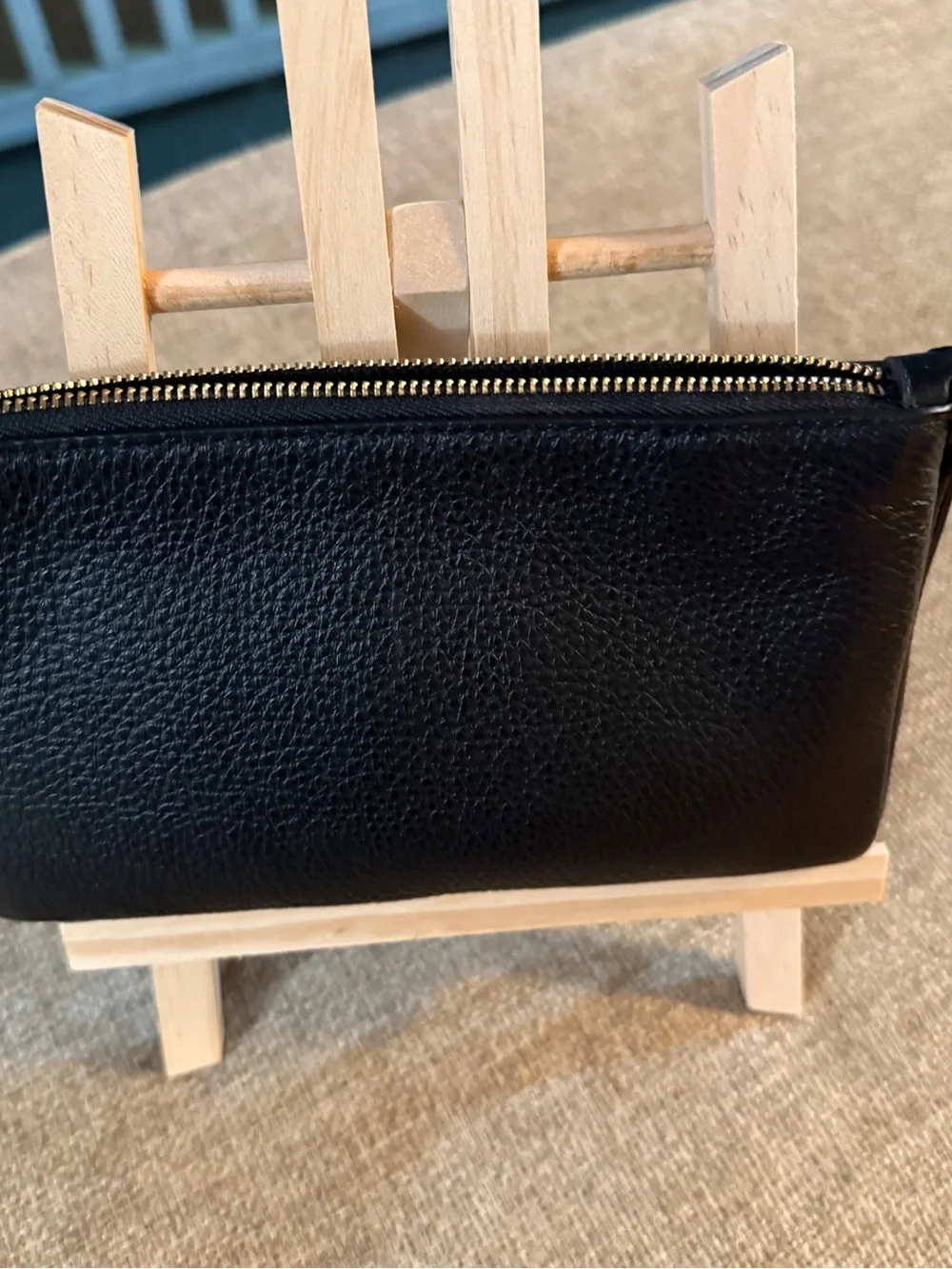 Coach Double Zip Wristlet crafted in black pebbled leather